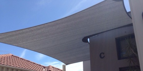 Small but essential A custom shade sail installed in an innaloo bedroom unit